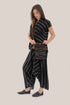 Sleeveless wrap top with crinkle striped and draped front